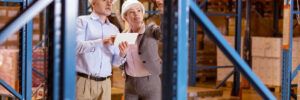 Two Warehouse colleagues standing together