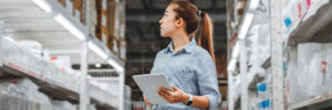 Warehouse Worker With Tablet Check Boxes