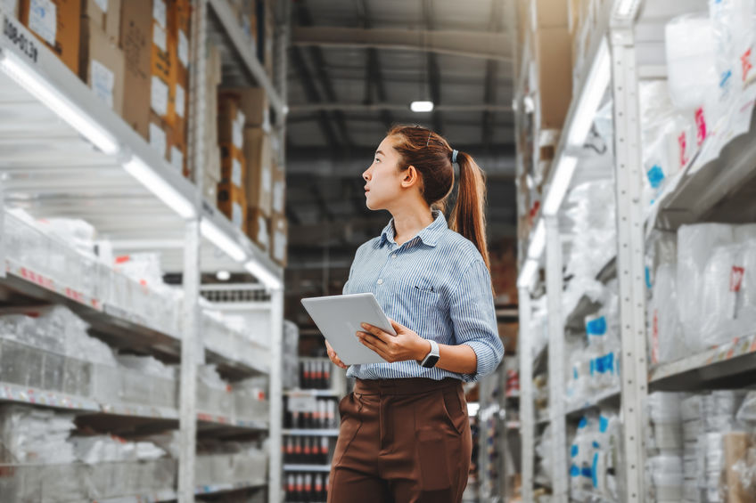 Warehouse Worker With Tablet Check Boxes