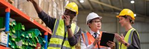 group of workers working at industrial warehouse